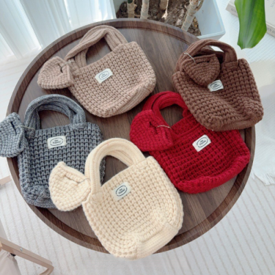 로페리아 솔리드 칼라 니트 미니 핸드백(0216627)